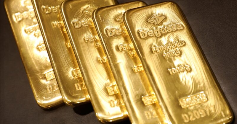 Gold eases as robust U.S. payrolls boost rate-hike bets